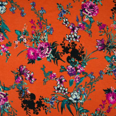 Viskosejersey "Burned Orange", Blumen auf Orange, leichter, elastischer Stoff für sommerliche Bekleidung, angenehm kühlend
